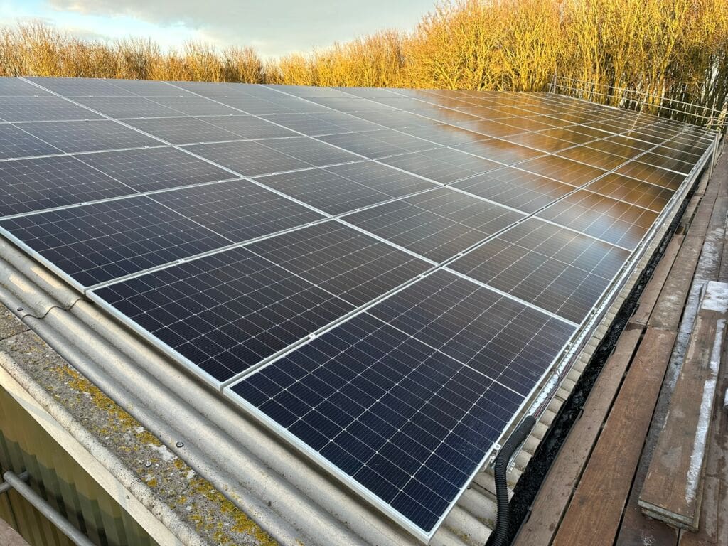 commercial solar warehouse Black solar panels on a warehouse roof